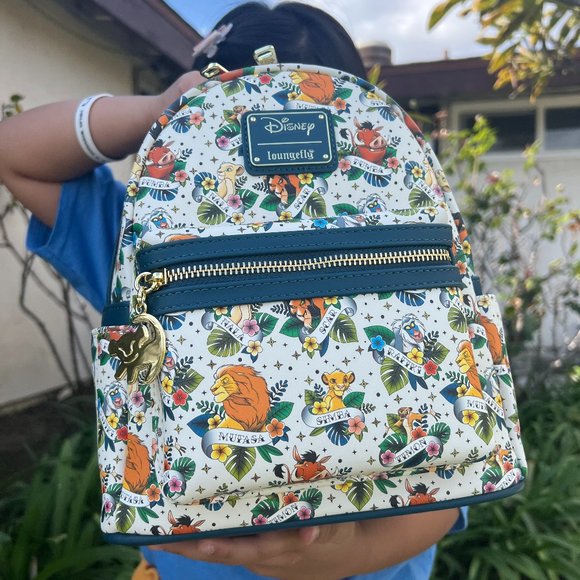 Loungefly Handbags - COLLECTION LOUNGE EXCLUSIVE LF LION KING TATTOO BACKPACK
